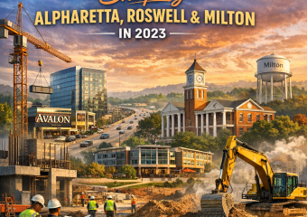 Cranes and workers on construction sites in Alpharetta, depicting ongoing major projects for 2023.